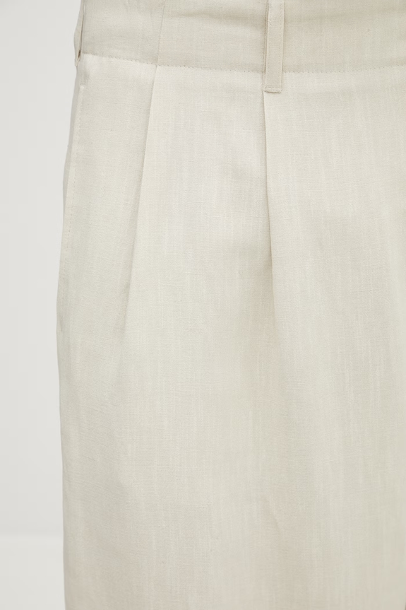 Maison Kitsuné kalhoty s viskózou pánské béžová QM01107WW9096