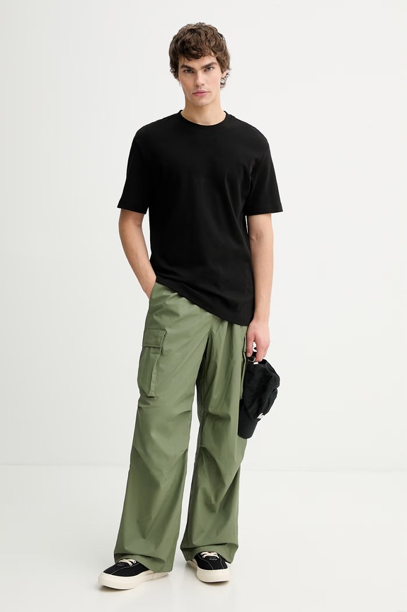 Odzież Rains spodnie dresowe 18310 Pocket Rain Pants Wide W3 18310.145 zielony