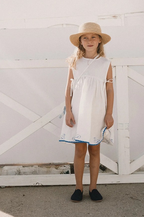 Detské šaty s prímesou ľanu Tinycottons SWANS BOWS DRESS jemný vzor biela SS26.229