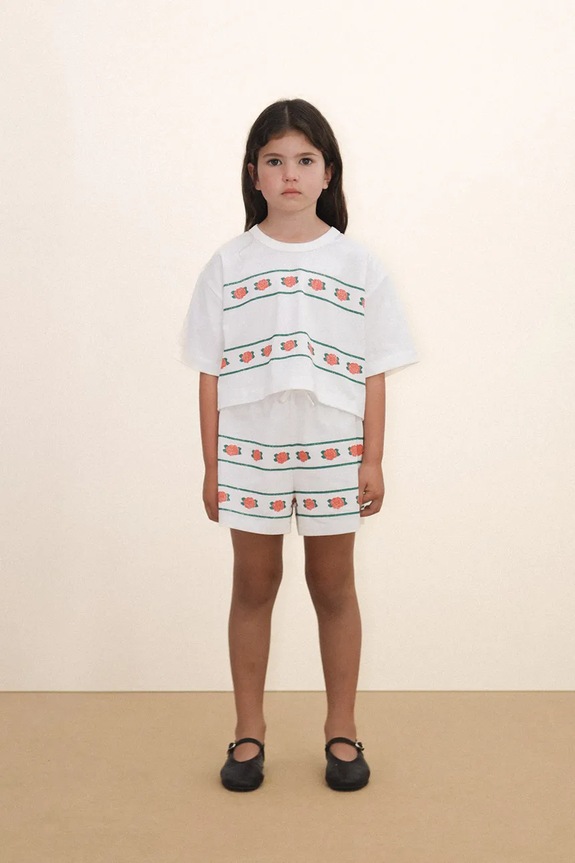 Tinycottons szorty bawełniane dziecięce ROSES SHORTS wzorzyste biały SS26.074