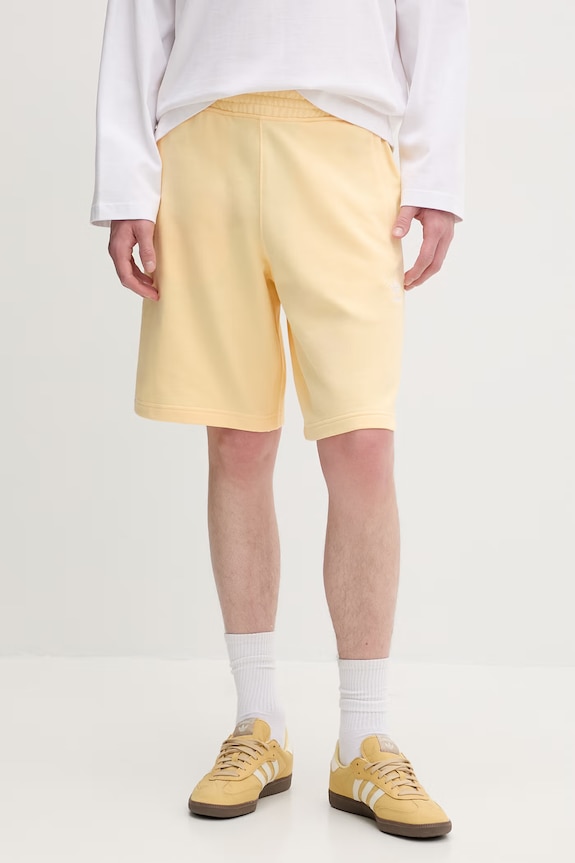 adidas Originals teplákové šortky pánske bavlnené žltá KE1163