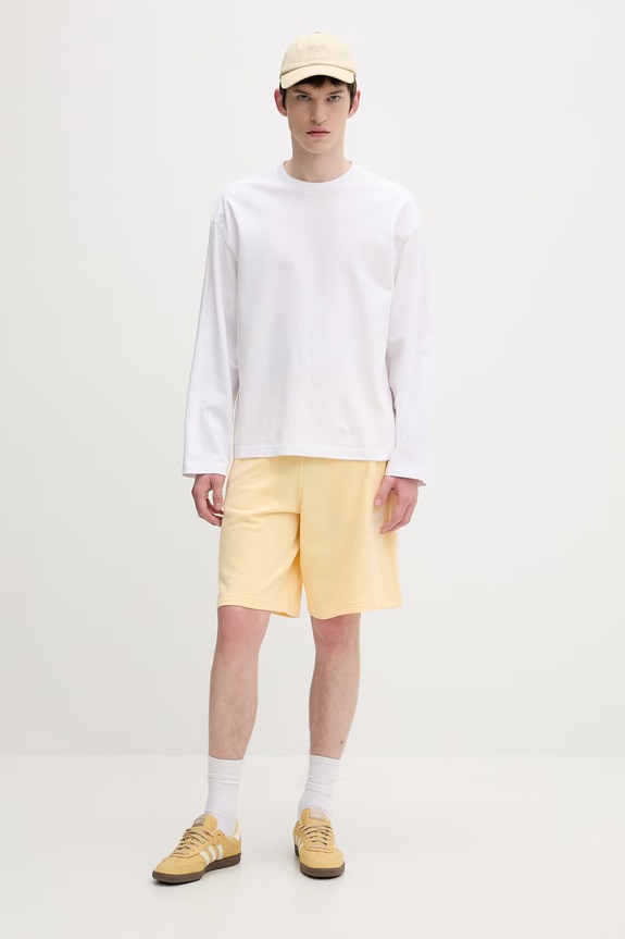 adidas Originals teplákové šortky pánske bavlnené KE1163 žltá SS26