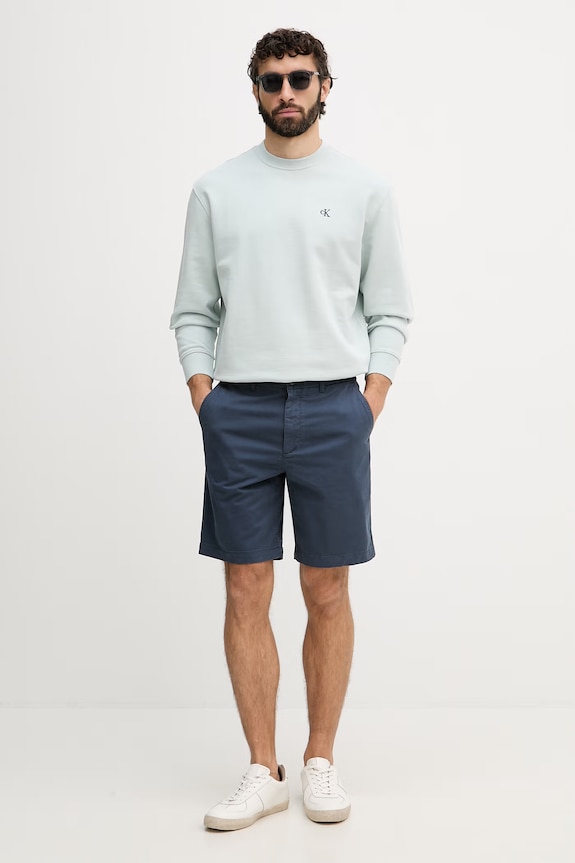 Calvin Klein Jeans šortky chino pánske bavlnené s elastanom LV04RF617G tmavomodrá SS26
