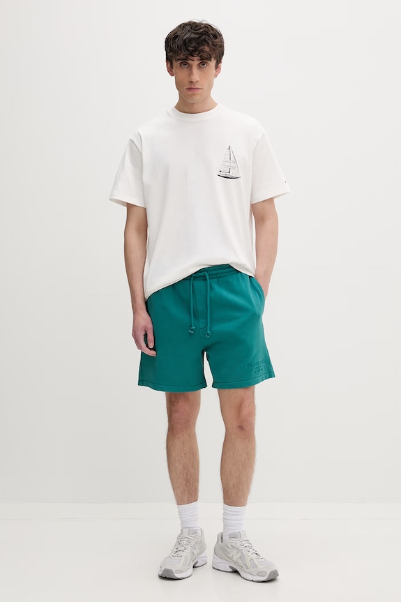 Tommy Jeans szorty dresowe męskie bawełniane DM0DM22696 turkusowy SS26