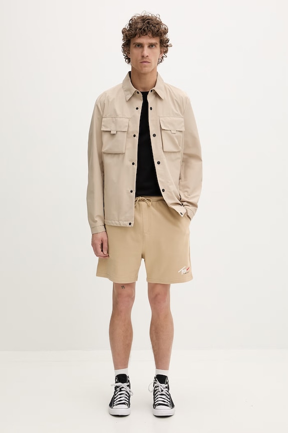 Tommy Jeans szorty dresowe męskie bawełniane DM0DM23017 beżowy SS26