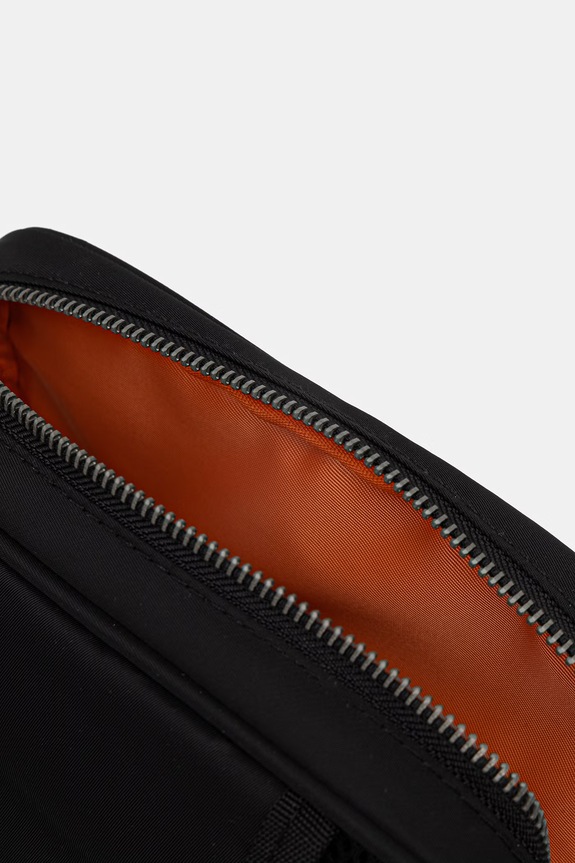 Taštička Alpha Industries Label Sling Bag 266944 černá