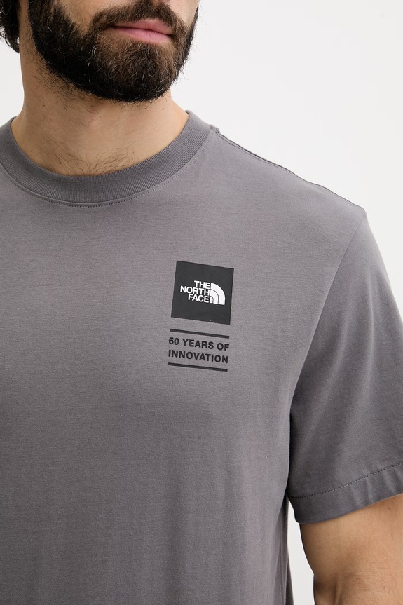 The North Face t-shirt ανδρικό βαμβακερό CELEBRATION NF0A8GAQ0UZ1 γκρί