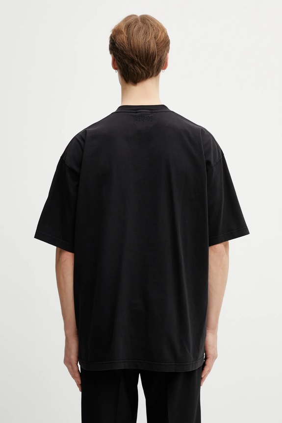 Хлопковая футболка VETEMENTS Sticker ME76TR228B чёрный