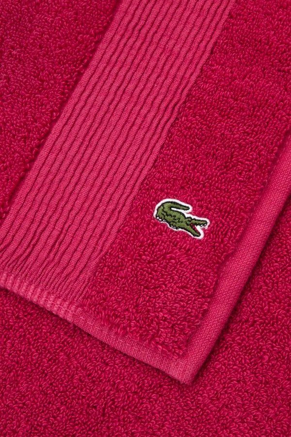 Бавовняний килимок для ванної кімнати Lacoste LLECROCO Bigarreau 50 x 70 cm колір фіолетовий