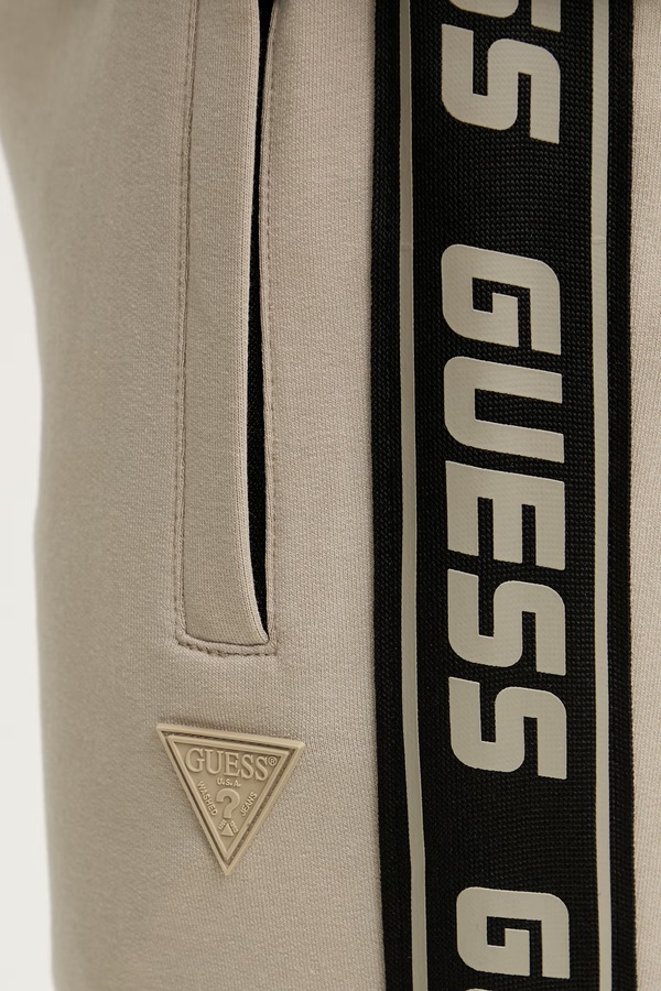 Спортивні штани Guess колір бежевий фото 4