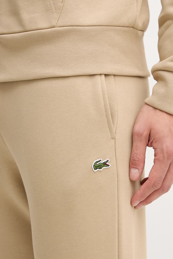 Спортивні штани чоловічі з бавовною Lacoste колір бежевий фото 4