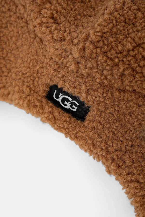Дитяча шапка UGG FLUFF TRAPPER колір коричневий