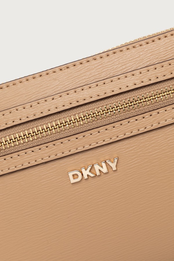 Сумка крос-боді жіноча шкіряна DKNY колір бежевий фото 4