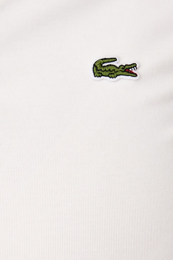 Поло жіноче з бавовною Lacoste колір бежевий фото 4