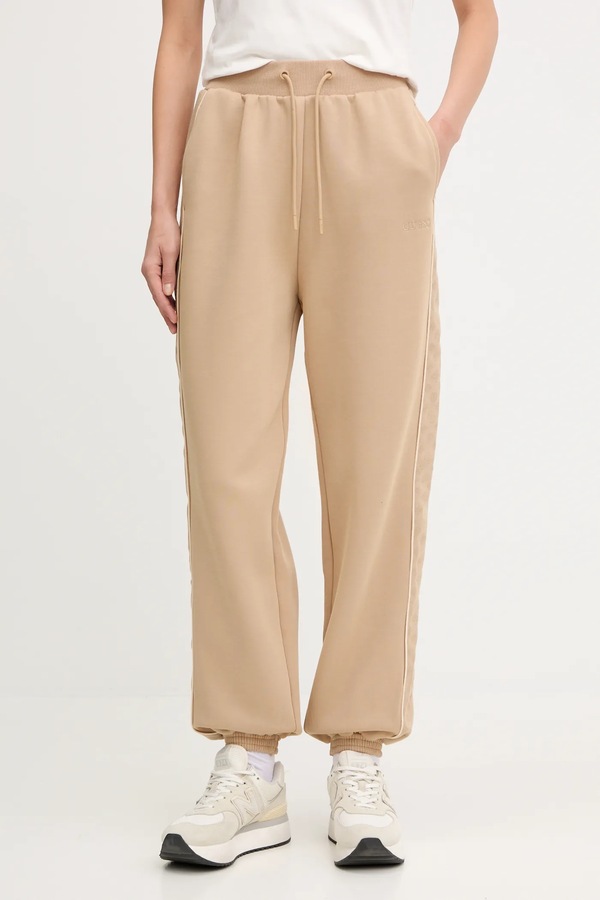 Детские спортивные брюки Guess MARYELLA цвет бежевый
