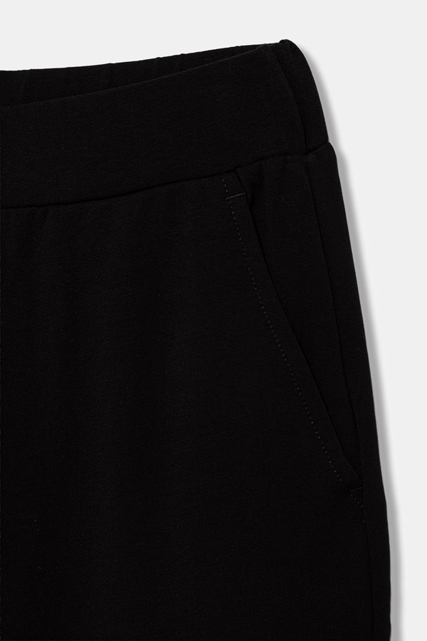 Спортивні штани дитячі бавовняні з еластаном EA7 Emporio Armani колір чорний фото 2