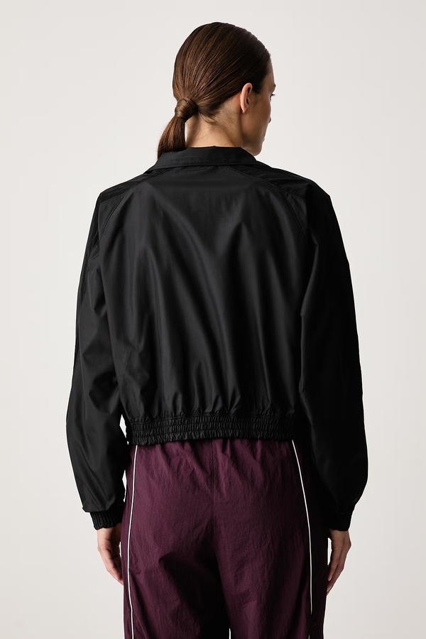Коротка куртка жіноча Under Armour Icon колір чорний фото 3