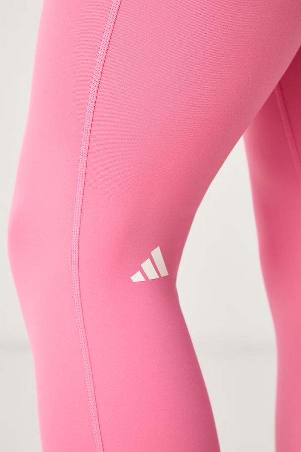 Легінси для йоги жіночі adidas Performance Three Stripes Studio колір рожевий фото 4