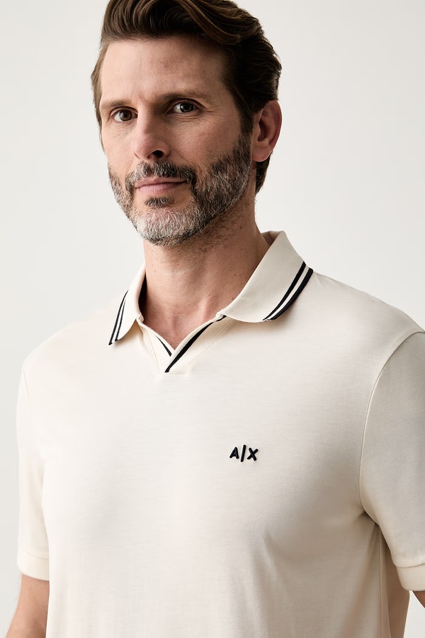 Поло чоловіче бавовняне Armani Exchange колір бежевий фото 4
