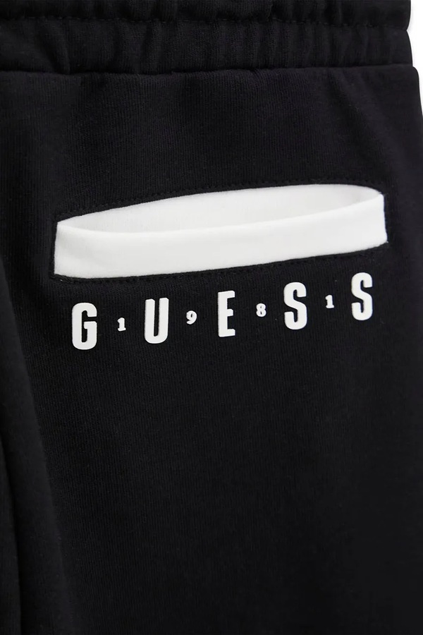 Спортивні штани дитячі бавовняні Guess колір чорний фото 3