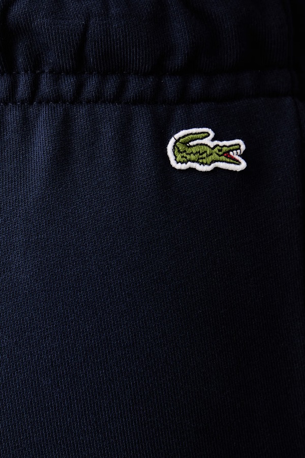Спортивні штани жіночі бавовняні Lacoste колір темно-синій фото 4