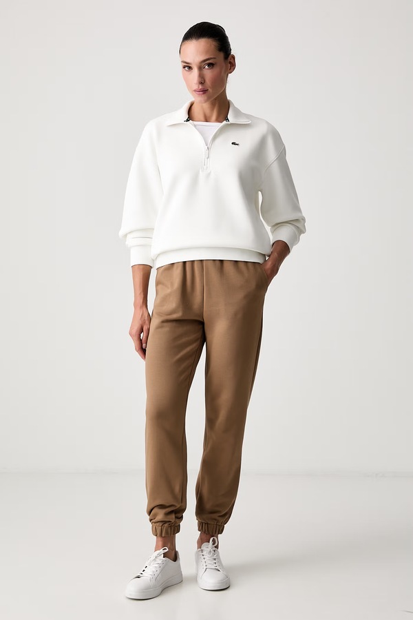 Спортивные брюки женские хлопковые Lacoste цвет коричневый