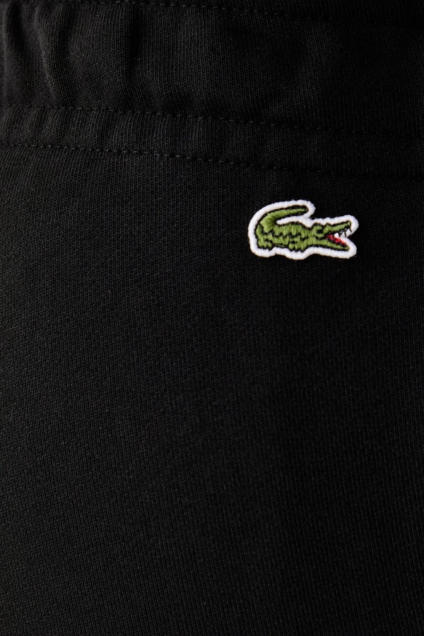 Спортивні штани жіночі бавовняні Lacoste колір чорний фото 4