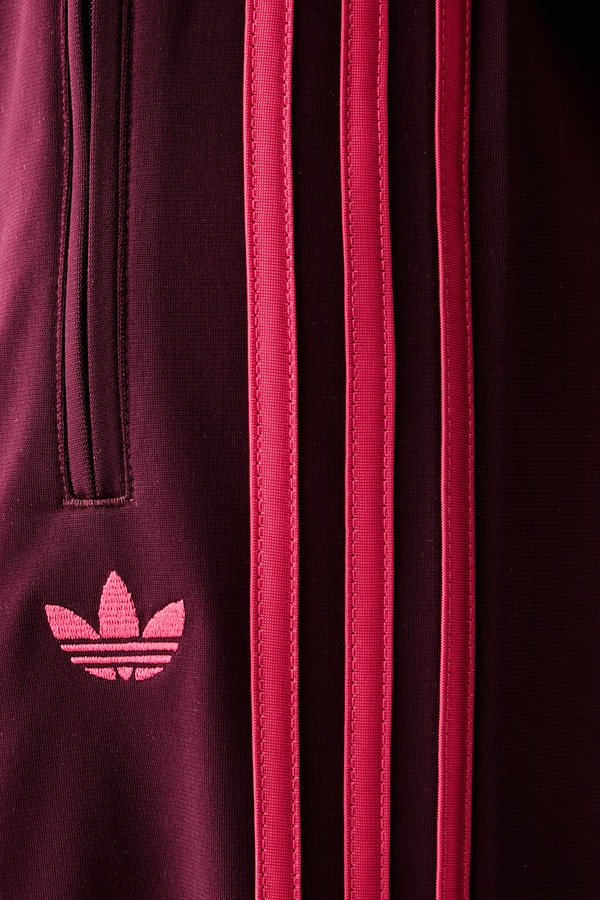 Спортивні штани жіночі adidas Originals Firebird колір бордовий фото 4