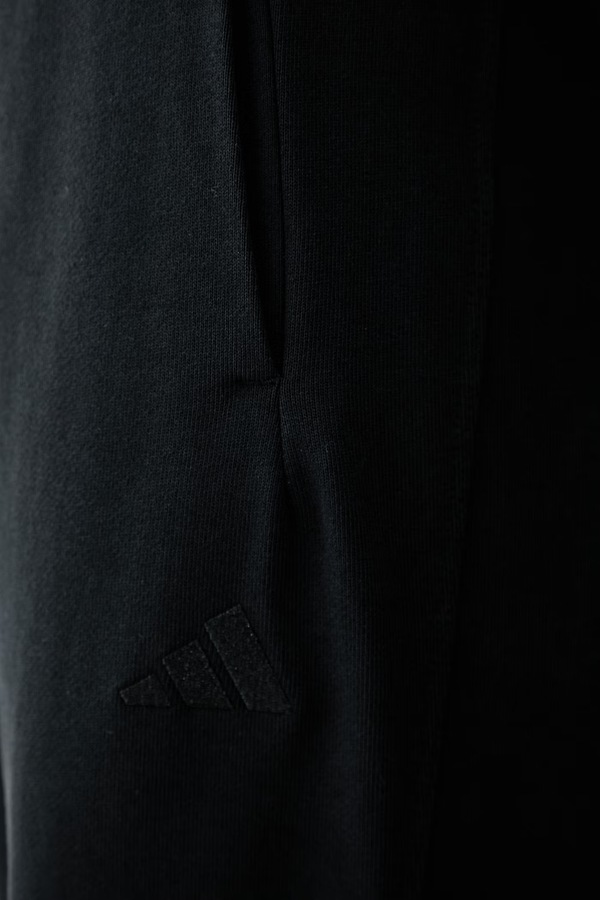 Спортивні штани жіночі бавовняні adidas колір чорний фото 4