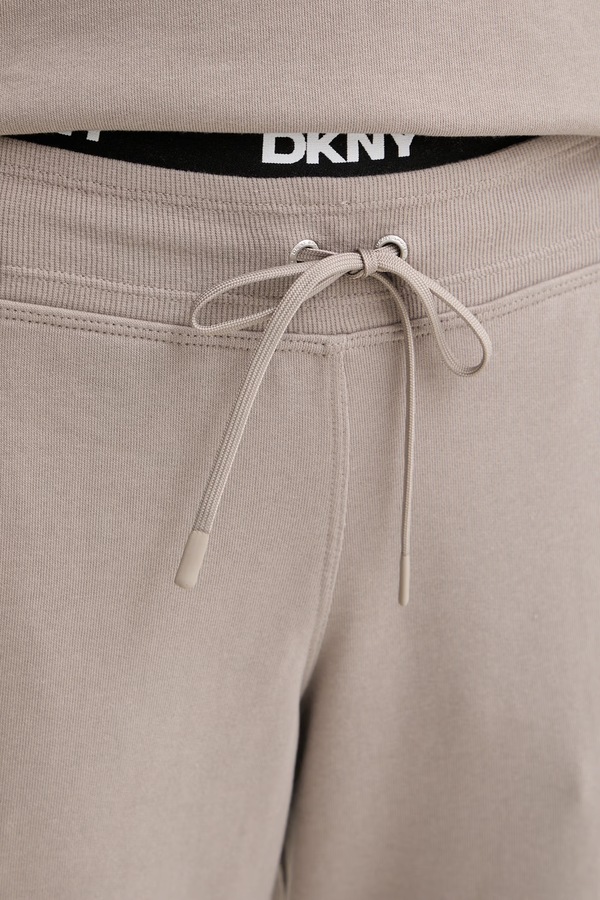 Спортивные брюки женские с хлопком DKNY цвет бежевый фото 2