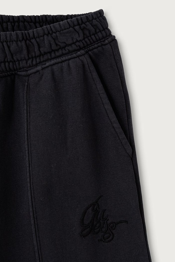 Спортивні штани дитячі бавовняні Guess колір чорний фото 3