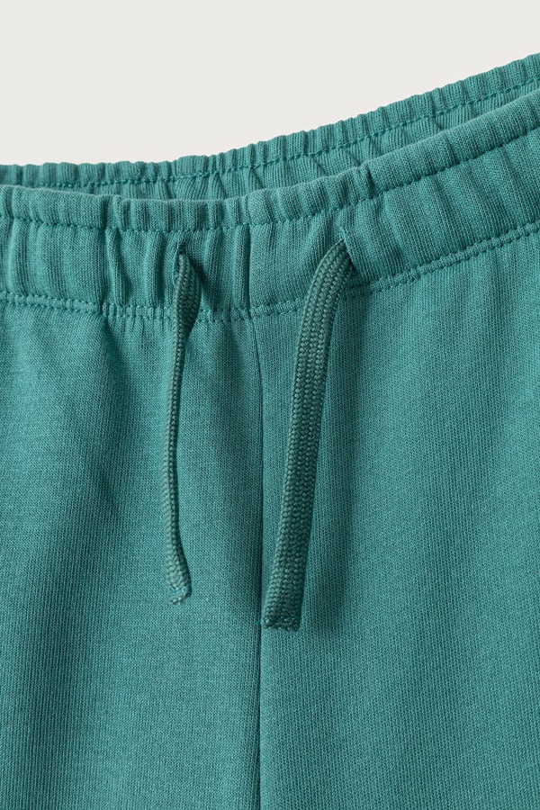 Спортивні штани дитячі бавовняні United Colors of Benetton колір бірюзовий фото 2