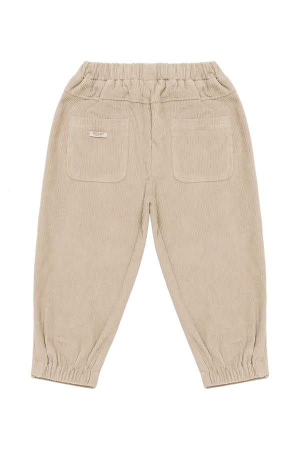 Спортивні штани дитячі бавовняні Donsje Patrik Trousers колір бежевий