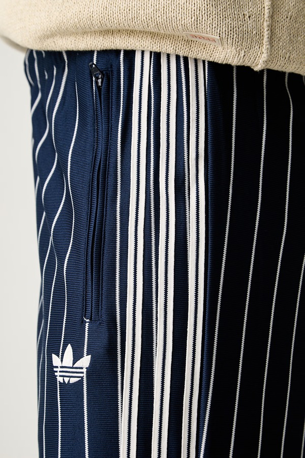 Спортивні штани чоловічі adidas Originals Firebird Pinstripes колір темно-синій фото 4