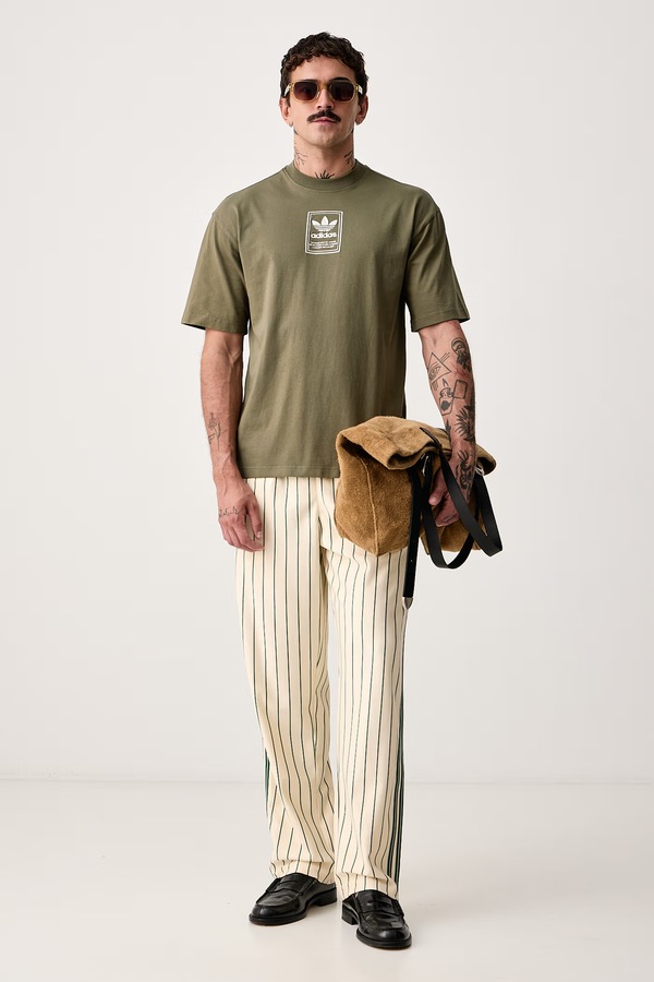 Спортивні штани чоловічі adidas Originals Firebird Pinstripes колір бежевий фото 2