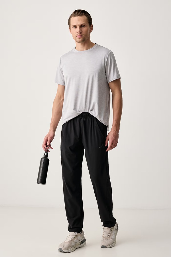 Штани для тренування чоловічі adidas Performance PrimeLift Essentials колір чорний фото 2