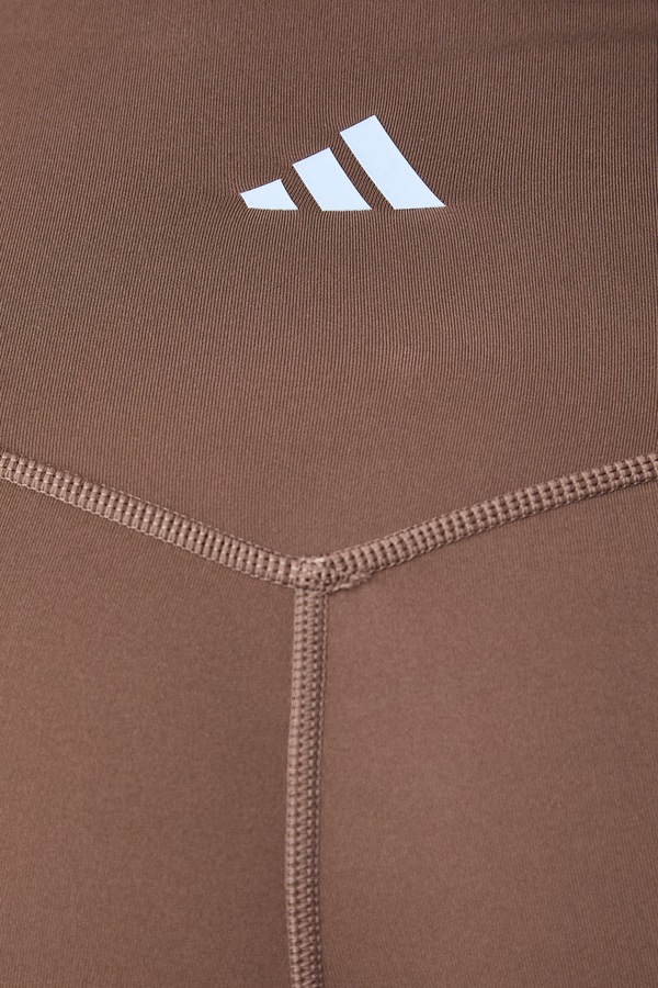 Шорти для йоги жіночі adidas Performance Three Stripes Studio колір коричневий фото 4