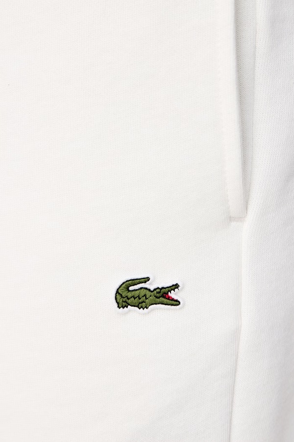 Трикотажні шорти чоловічі з бавовною Lacoste колір бежевий фото 4