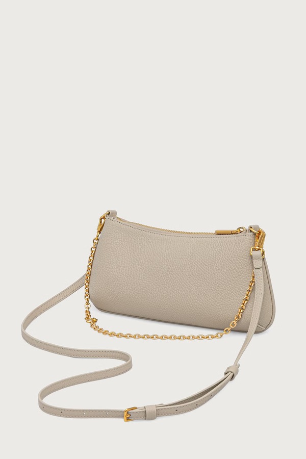 Сумка крос-боді жіноча шкіряна Coccinelle колір бежевий фото 2