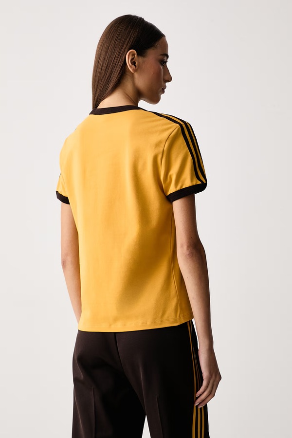 Футболка жіноча бавовняна з еластаном adidas Originals колір жовтий фото 2