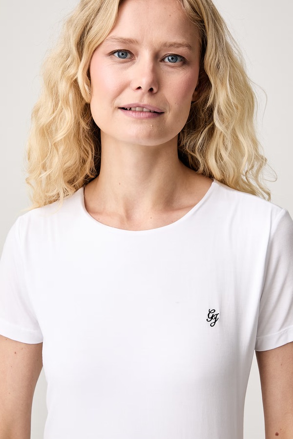Футболка basic жіноча із модалу Guess Jeans колір білий фото 4
