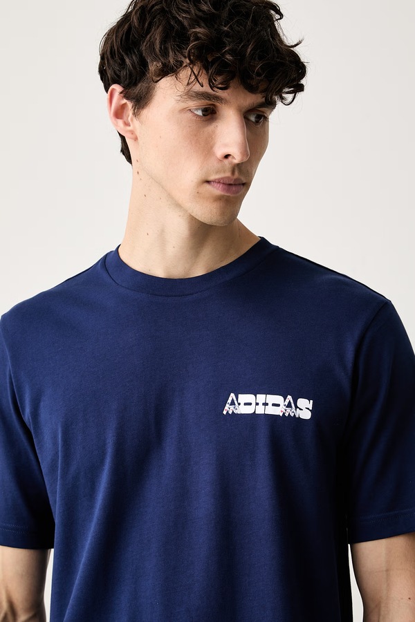 Футболка чоловіча бавовняна adidas Novelty колір темно-синій фото 4
