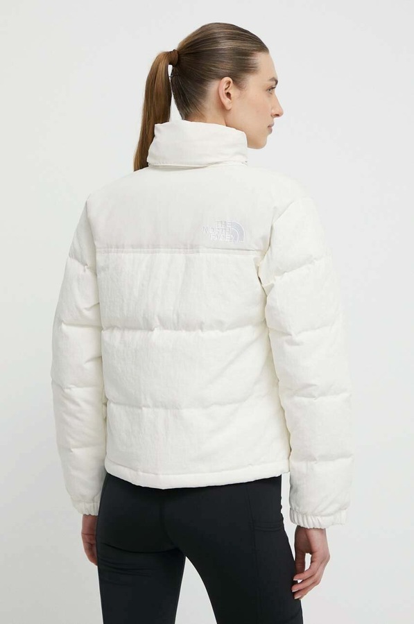 Пухова куртка The North Face колір бежевий фото 3
