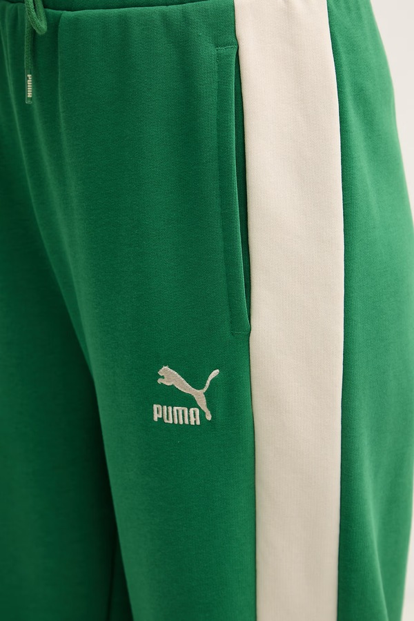 Спортивні штани жіночі Puma ICONIC T7 колір зелений фото 4