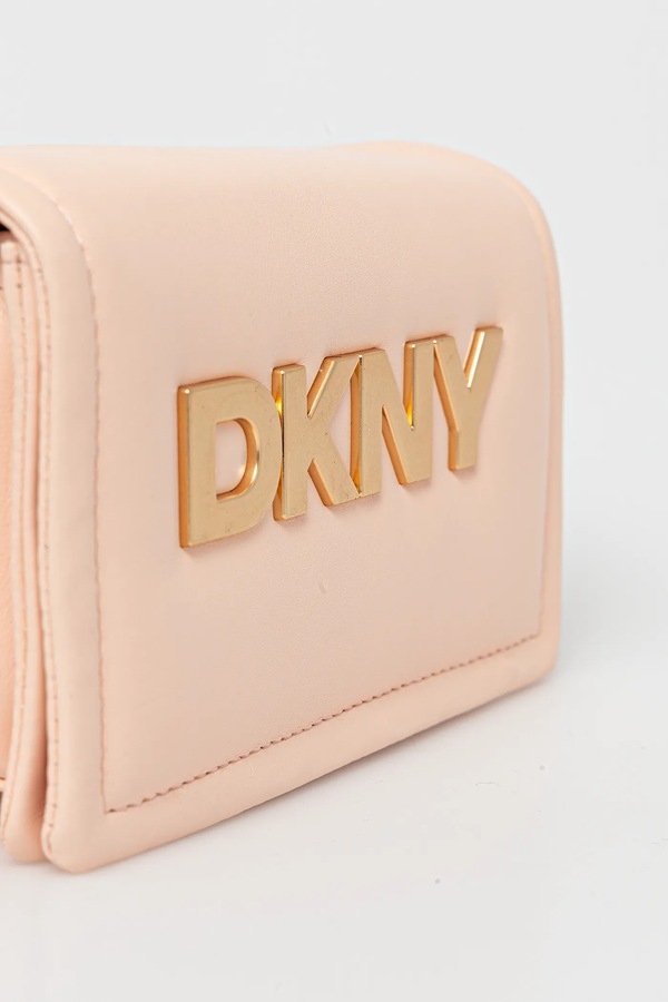Шкіряна сумочка DKNY колір бежевий фото 4