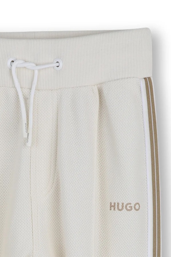 Спортивні штани дитячі бавовняні HUGO колір бежевий фото 3