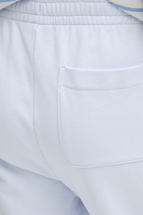 Спортивні штани жіночі Lacoste колір блакитний фото 4
