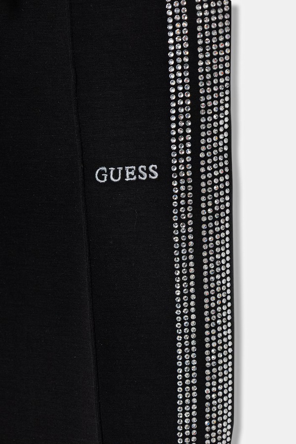 Дитячі спортивні штани Guess колір чорний фото 2
