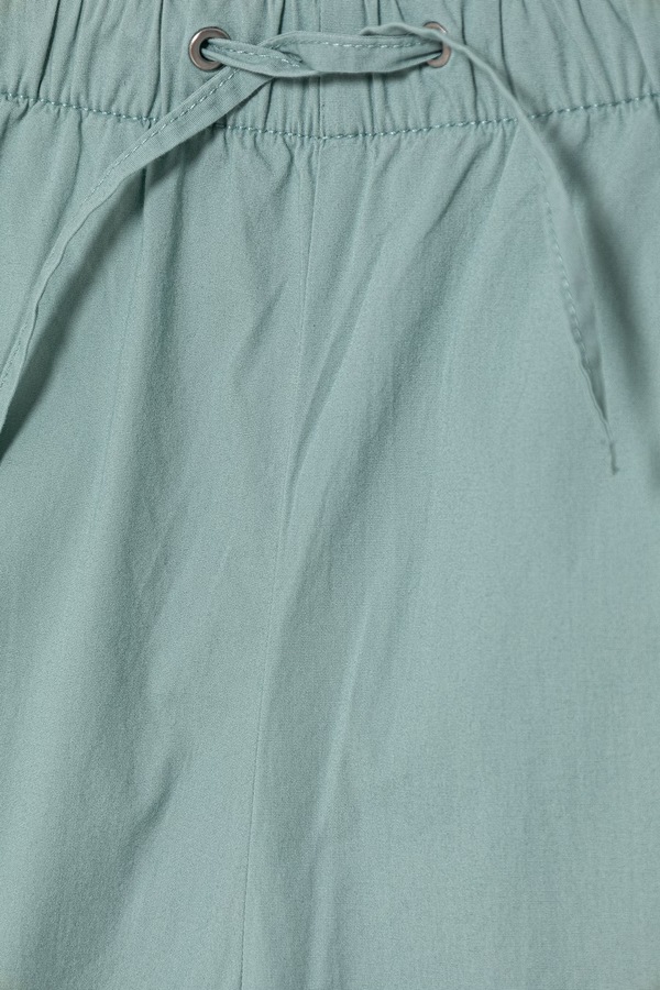 Джоггеры детские из хлопка United Colors of Benetton цвет зеленый фото 2