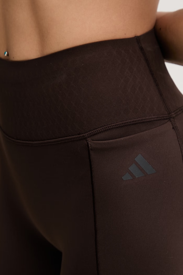 Спортивні шорти жіночі adidas Performance колір коричневий фото 4